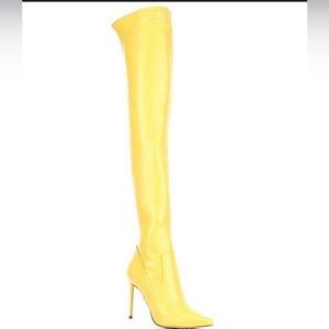 Yellow Steve Madden over the knee boots